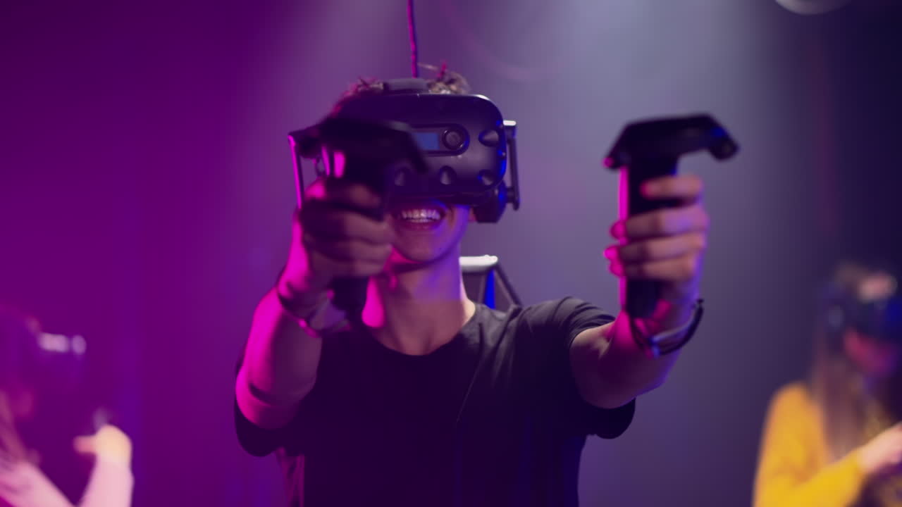 Boy playing with a Virtual Reality headset in a studio