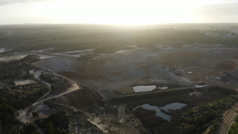 Giant-hole-in-the-ground-as-a-landfill-in-the-middle-of-the-woods