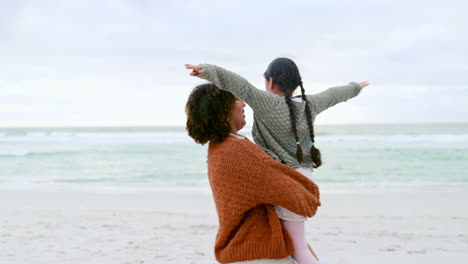 Family,-playing-and-mother-with-child-at-beach