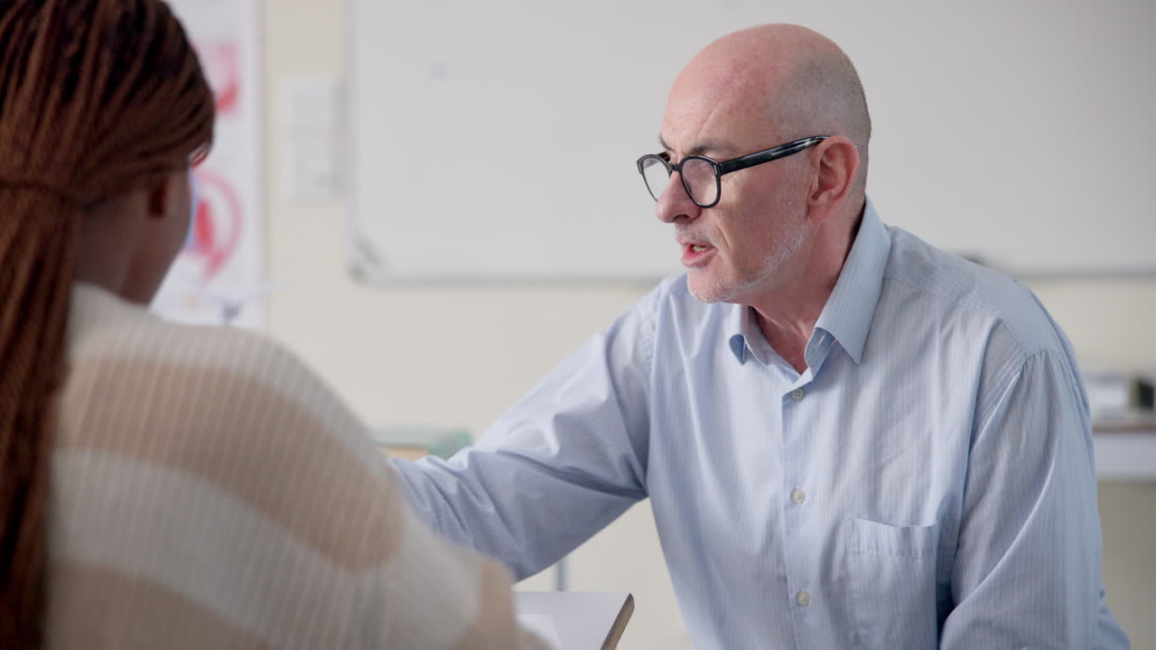 Doctor consulting with patient in office