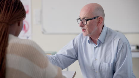 doctor consulting with patient in office