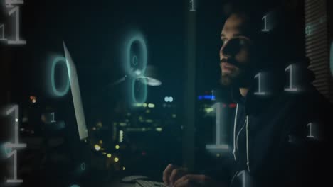 Hacker-using-computer-in-dark-room