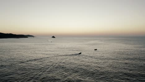 Aerial-View-Of-Speedboat-Cruising-In-The-North-Pacific-Ocean-Near-Mazunte-In-Mexico