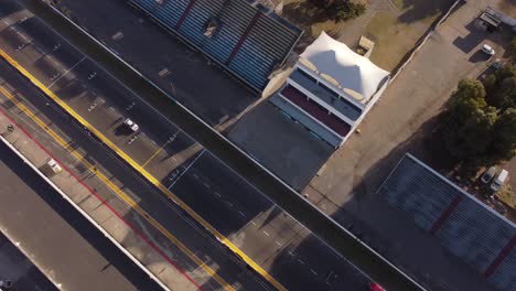 Aerial-view-of-racing-cars-crossing-finish-line-during-race-in-Argentina