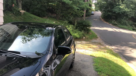 man getting in a car