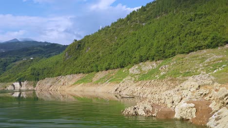 Slow-motion-clip-of-the-river-cruise-among-canyon-walls-of-the-Shennong-Xi-Stream,-Yangtze-River-tributary,-China