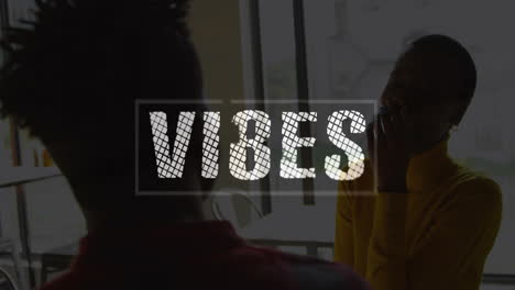 text vibes over two people talking in bright room with animation effects