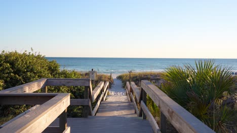 wooden path to the panama city beach on a sunny day