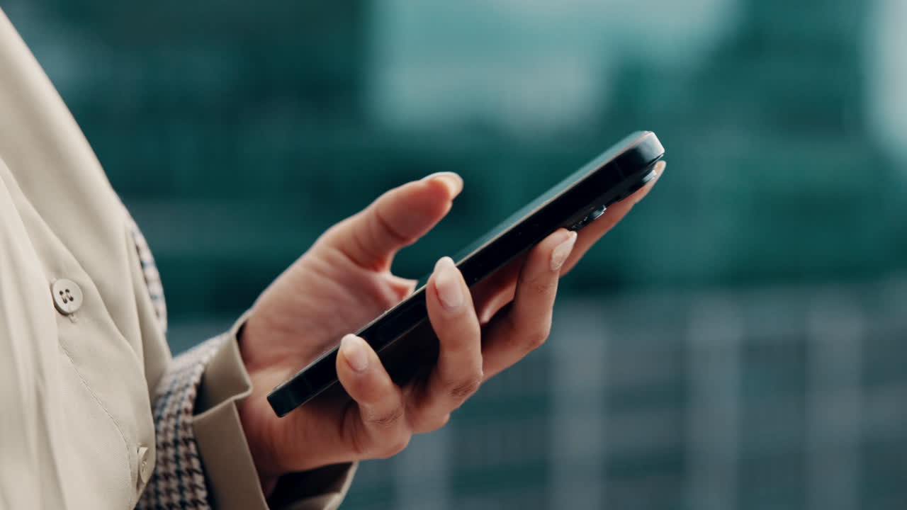 Close-up of a hand holding a smartphone