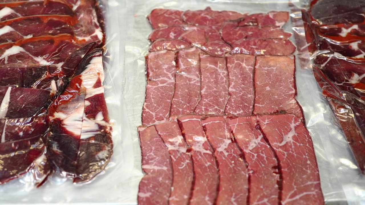 Vacuum Packed Slices of Cured Beef and Dried Meat