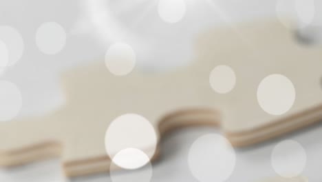 animación del bokeh sobre el rompecabezas beige