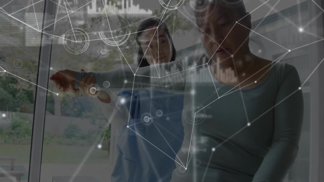 Therapist guiding patient in medical therapy room, displaying holographic network nodes, bar charts