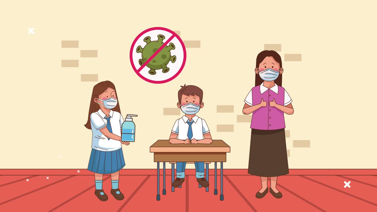 교사와 학생들이 교실에서 의료 마스크를 착용하고 있습니다.