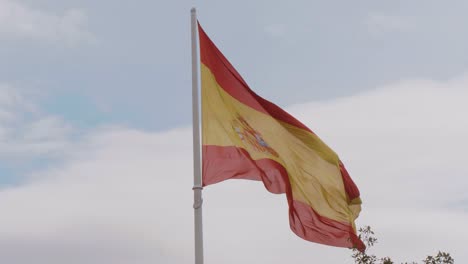 spanish flag waving in the wind