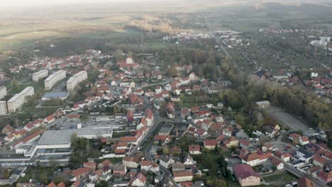 Drone-Aerial-view-of-Thale,-the-Rosstrappen,-Hexenstieg,-Hexentanzplatz-and-the-Bodetal-in-the-north-of-the-Harz-national-Park-in-late-autumn-at-sunset,-Germany,-Europe