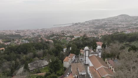 Drone-shot-of-a-city-next-to-the-sea