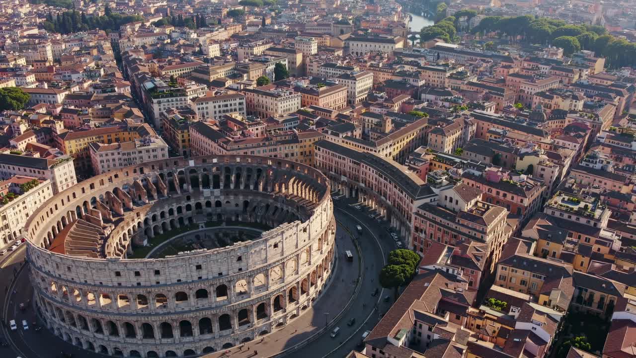 Aerial view video of the Colosseum and surrounding cityscape in Rome, showcasing ancient