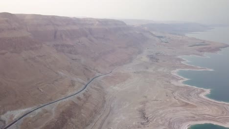 Aerial-view-of-the-Dead-Sea-and-the-surrounding-cliff-from-the-desert