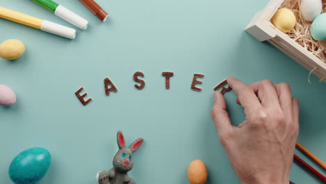 easter text with eggs background