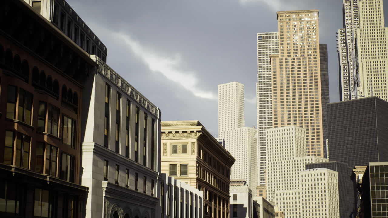 Urban skyline displays diverse architectural styles under dramatic clouds