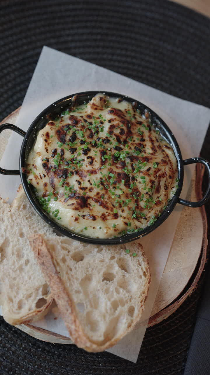 Baked cheese casserole with bread