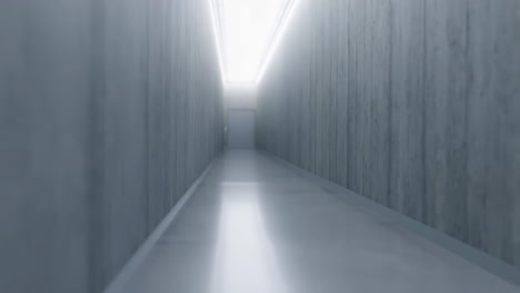 long, narrow, and bright concrete corridor