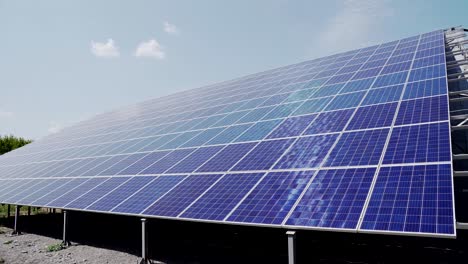 blue solar photovoltaic panels on the roof of a house to produce electricity. efficient, uninterrupted operation of systems at the power plant