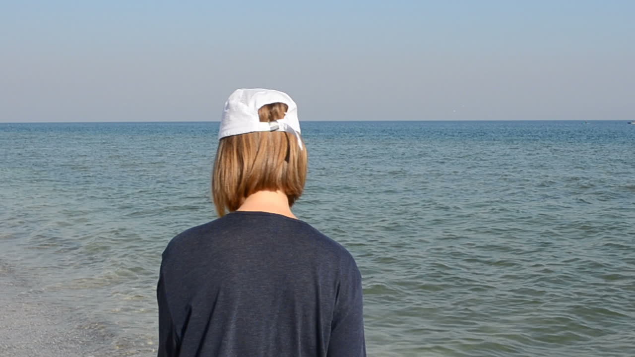 Walk on a beach. The girl on a beach