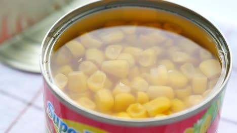 open can of canned corn