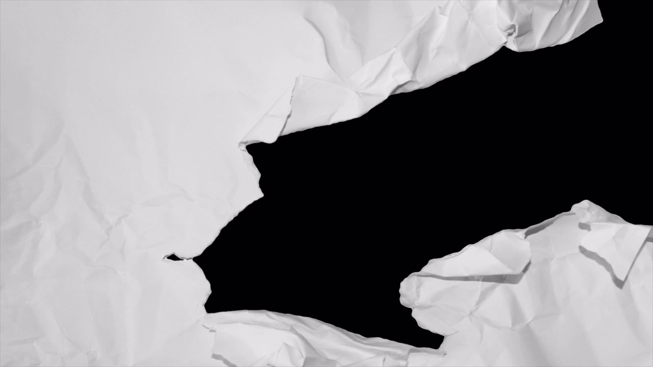Animated Crumpled White Paper Transition with Torn Edges