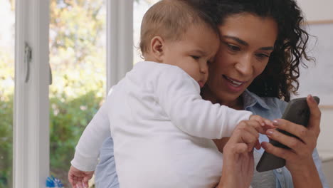 happy mother and baby having video chat using smartphone mom holding toddler enjoying mobile technology sharing motherhood lifestyle with friend on social media