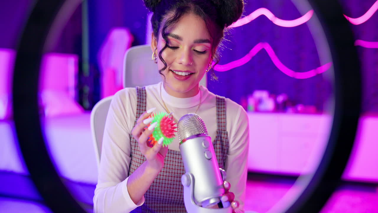 Woman Vlogging with Microphone and Ring Light