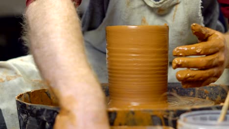 potter makes a jug