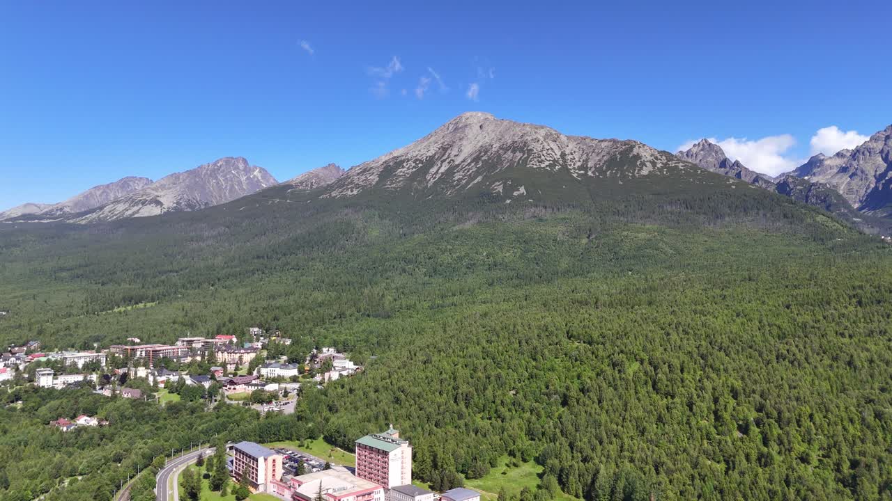 Drone view of Starý Smokovec in the High Tatras, Slovakia. Stunning mountain scenery, green forests, and peaceful summer atmosphere