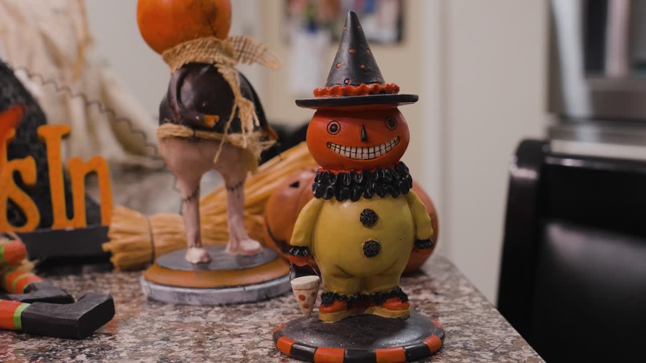 Statue of a small pumpkin trick or treat figure