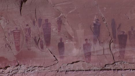 a slow zoom into ancient and mysterious giant petroglyphs in canyonlands national park utah