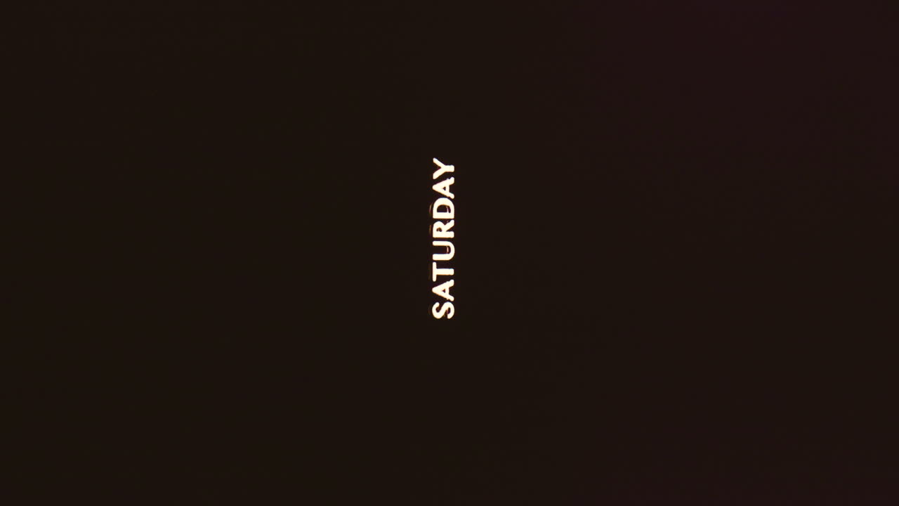 Saturday in white text vibrates glitching out on vertical format