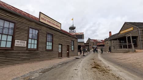 old buildings and people in period attire