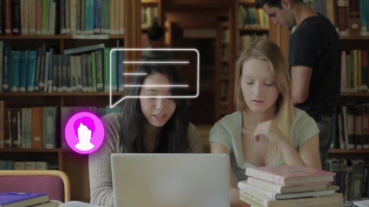 Animation of profile and message icon over two diverse girls using laptop and studying at college