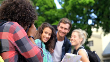 Man-taking-photo-of-his-friends