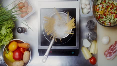 cooking pasta and vegetables