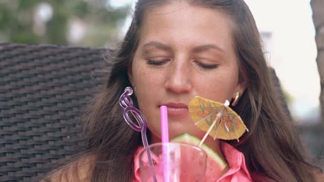 close girl with long loose flowing hair smiles and relaxes