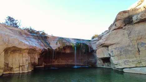 a waterfall in the middle of the sahara desert algeria biskra