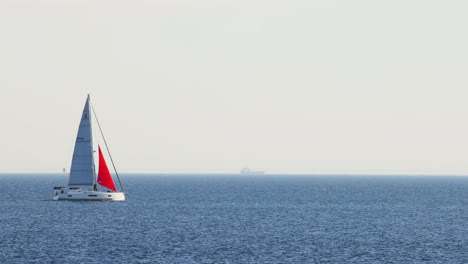 sailboat gliding across calm ocean waters