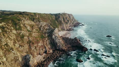 coastal cliffs and lighthouse at cabo da roca, portugal