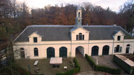 aerial - buildings around staverden castle, veluwe, netherlands, forward rising