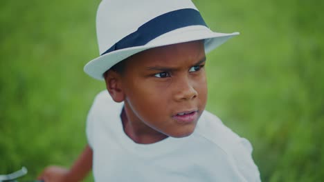 smiling boy in a hat