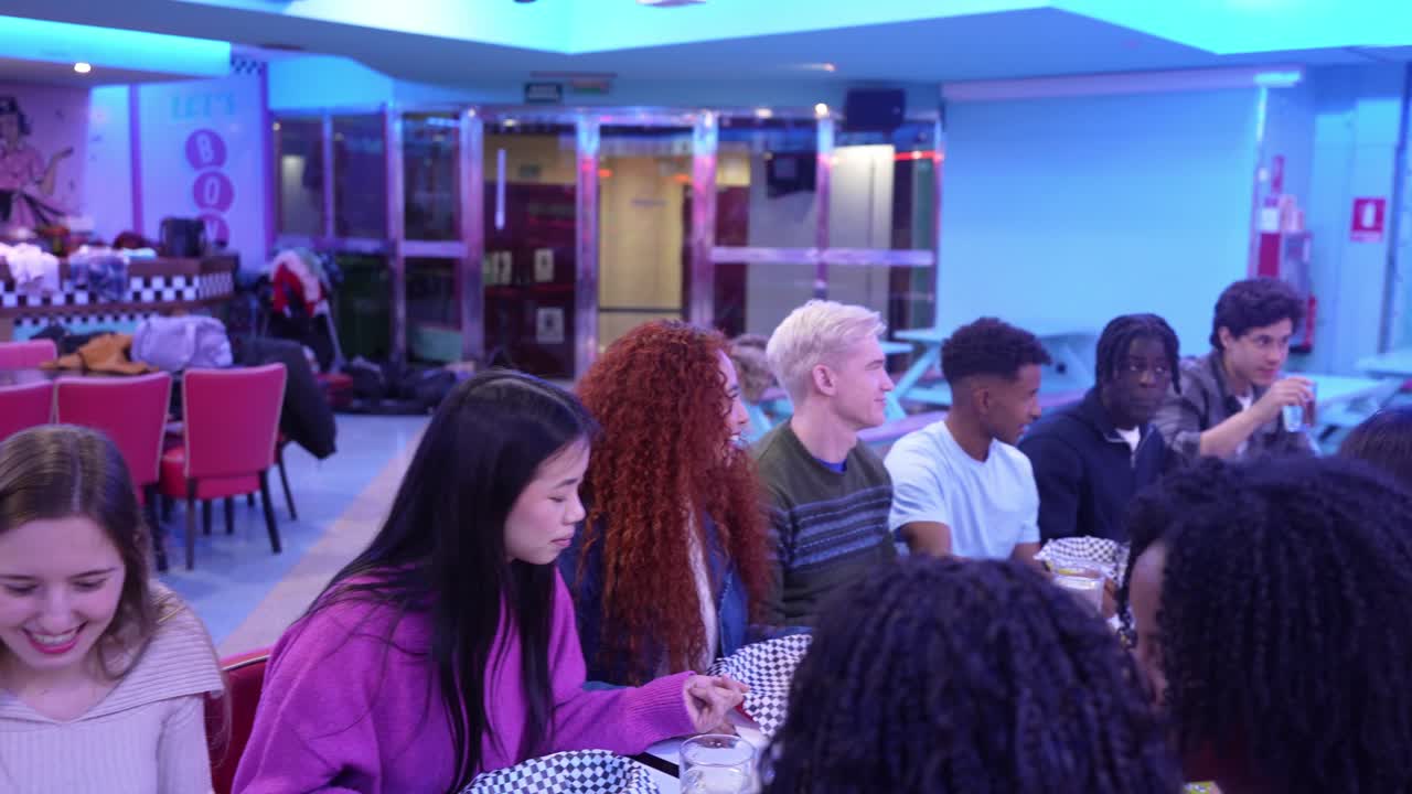 A group of people gathering at a diner
