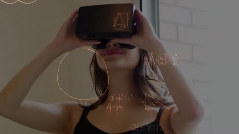 Animation-of-mathematical-drawings-and-equations-over-woman-wearing-vr-headset