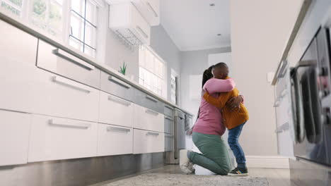 Hug,-kitchen-and-black-family-child